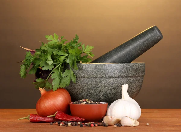 Set of ingredients and spice for cooking on wooden table on brown background — Stock Photo, Image