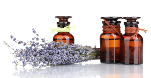 Lavender flowers and glass bottles isolated on white — Stock Photo, Image