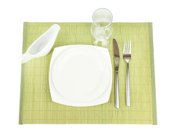 Table setting on a bamboo mat — Stock Photo, Image