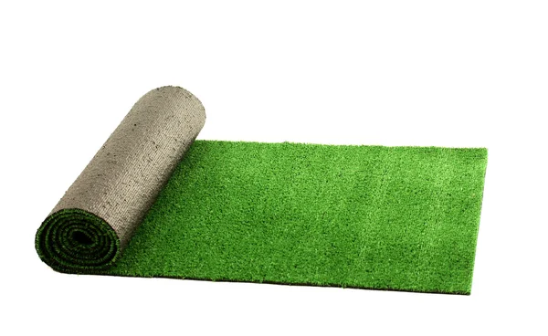 Umělé válcované zelené trávě, izolované na bílém — Stock fotografie