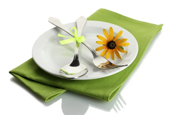 Spoon, fork and flower on plate, isolated on white — Stock Photo, Image