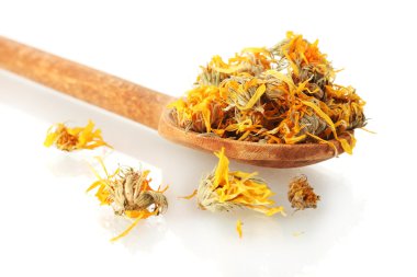 Dried calendula flowers in wooden spoon, isolated on white clipart