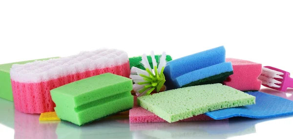 Many colorful sponges and brushes for housework isolated on white — Stock Photo, Image