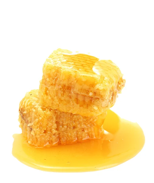 Panales dorados con miel aislada en blanco — Foto de Stock