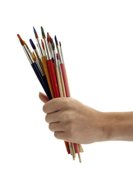 Hand with brushes isolated on white — Stock Photo, Image