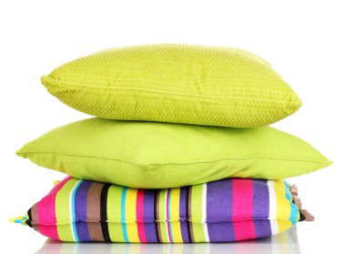 Bright color pillows isolated on white