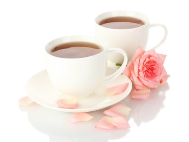 Cups of tea with rose isolated on white clipart