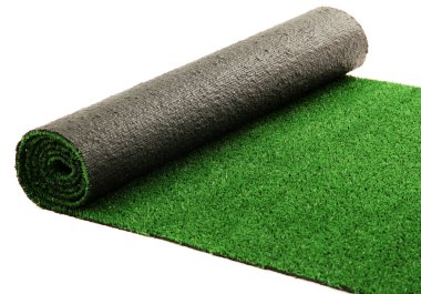 Artificial rolled green grass, isolated on white clipart