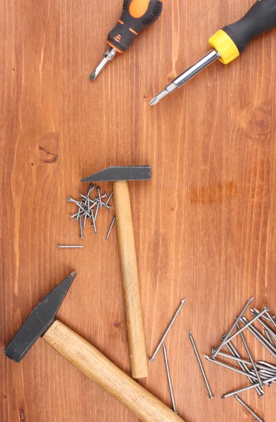 Conjunto de herramientas e instrumentos sobre fondo de madera —  Fotos de Stock