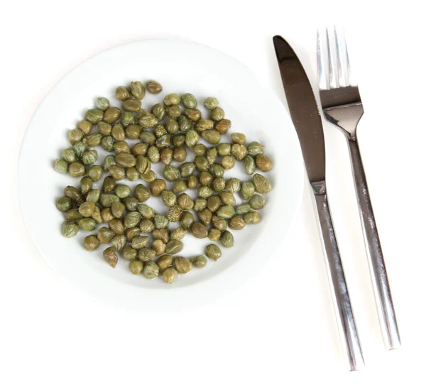 Capers in the plate isolated on white — Stock Photo, Image