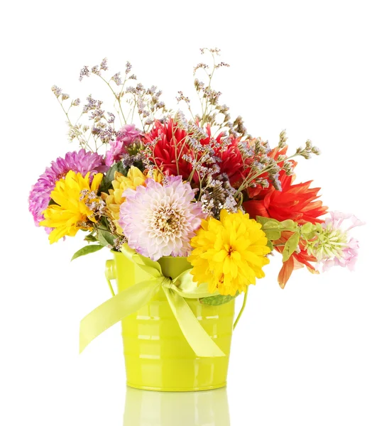 Bright green bucket with flowers isolated on white — Stock Photo, Image