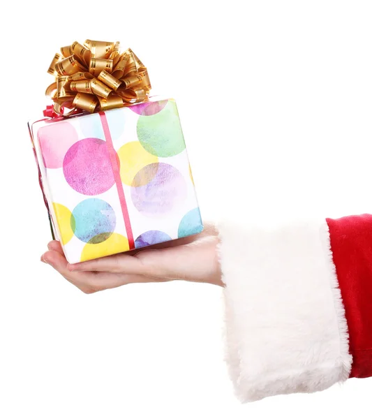 Noel Baba el üzerinde beyaz izole hediye kutusu tutarak — Stok fotoğraf