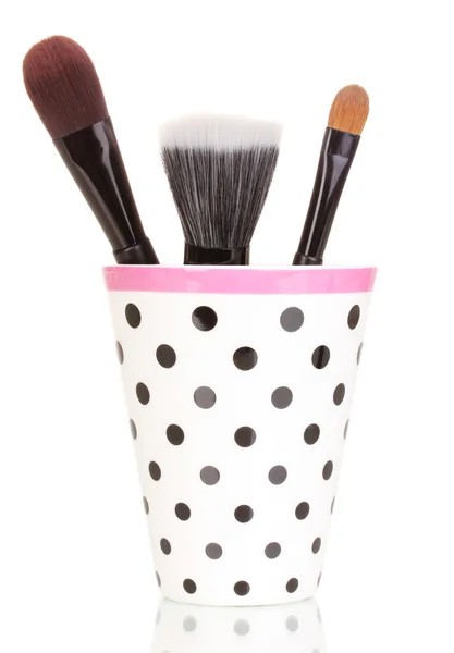 Cosmetic brushes in cup isolated on white — Stock Photo, Image
