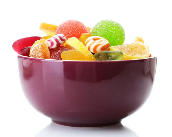 Colorful jelly candies in purple bowl isolated on white — Stock Photo, Image