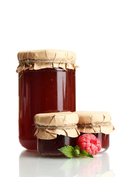Jars with jam and ripe raspberries with mint isolated on white — Stock Photo, Image