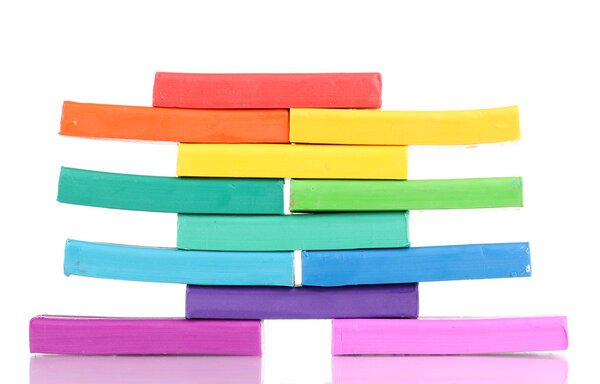 Children bright plasticine isolated on white