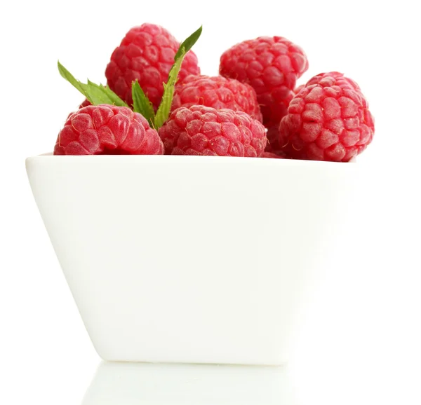 Ripe raspberries with mint in bowl isolated on white — Stock Photo, Image