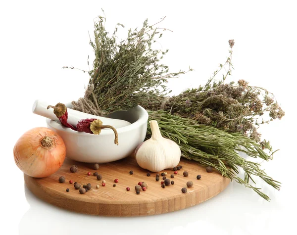 Dried herbs in mortar and vegetables, isolatrd on white — Stock Photo, Image