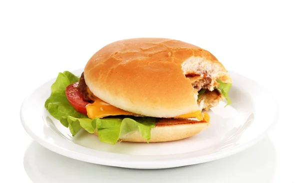 Bitten cheeseburger on plate isolated on white — Stock Photo, Image