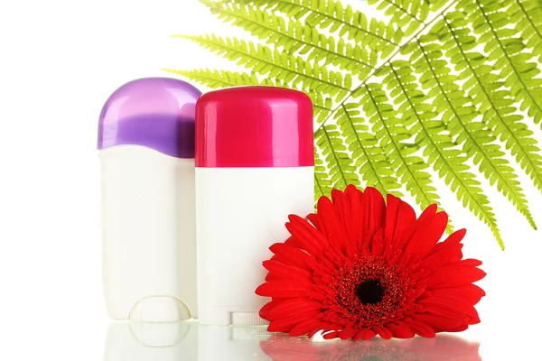 Deodorants with flower and green leaf isolated on white — Stock Photo, Image