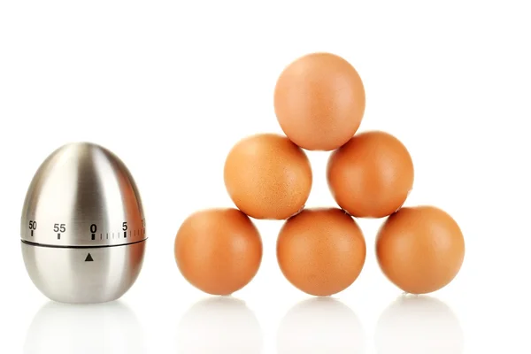 Egg timer and eggs isolated on white — Stock Photo, Image