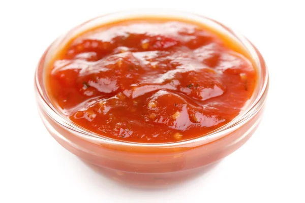 Tasty ketchup in bowl isolated on white — Stock Photo, Image