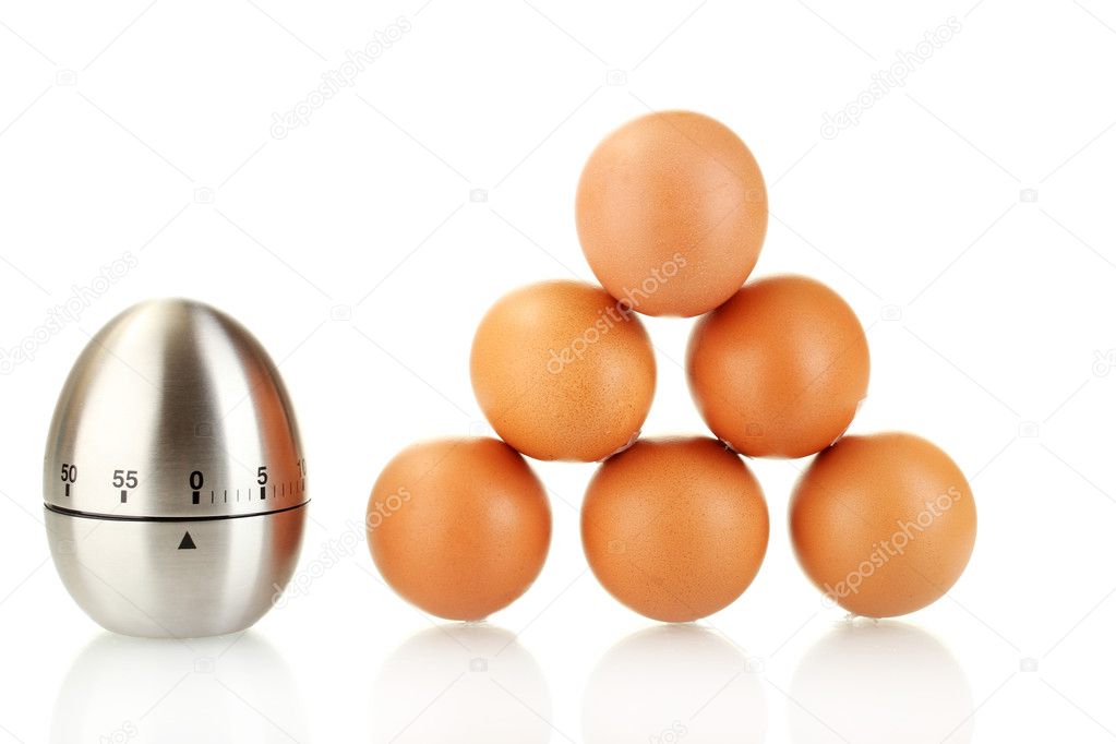 Egg timer and eggs isolated on white