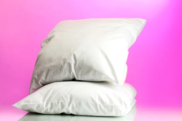 Poduszki, na tle różowy — Zdjęcie stockowe