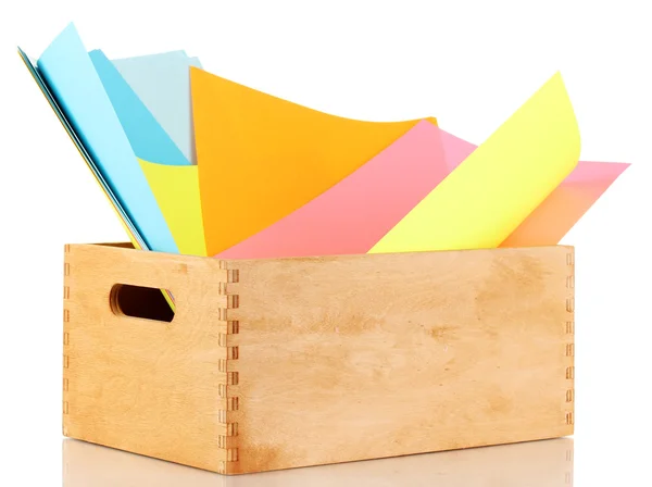 Houten kist met kleurrijke papieren geïsoleerd op wit — Stockfoto