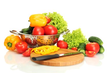 Fresh vegetables and knife on cutting board isolated on white clipart