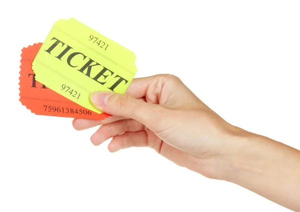 Рука женщины держит красочные билеты на белом фоне крупным планом — стоковое фото