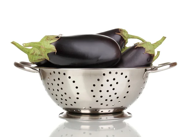 Fresh eggplants in colander isolated on white — Stock Photo, Image