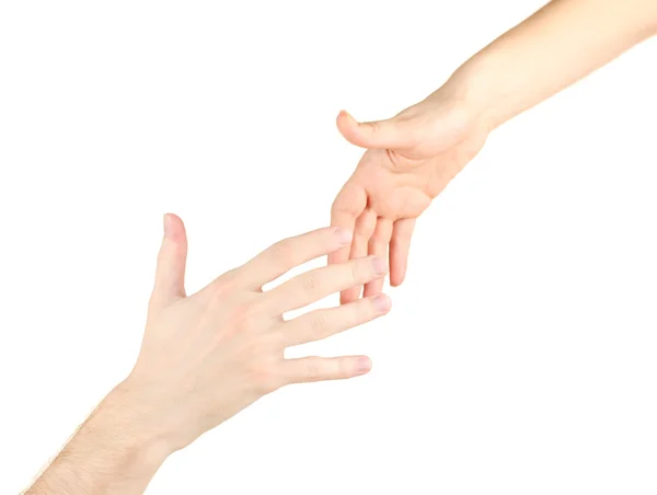 Women's hand goes to the man's hand on white background — Stock Photo, Image