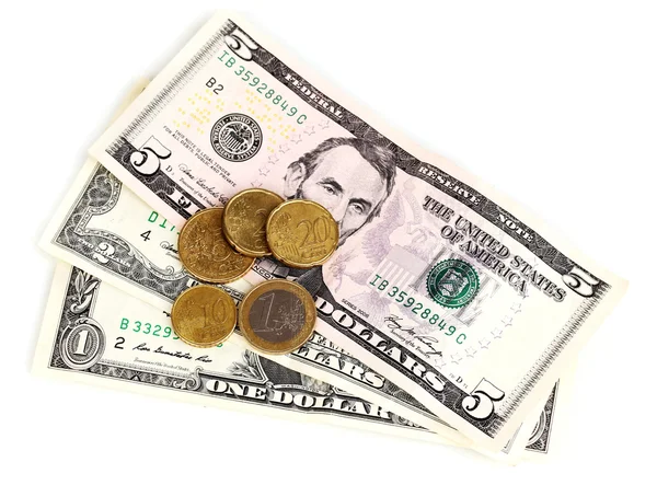 Dollarsedlar och mynt isolerade på vitt — Stockfoto