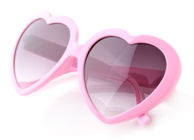 Pink heart-shaped sunglasses isolated on white clipart