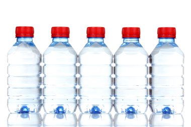 Plastic bottles of water isolated on white