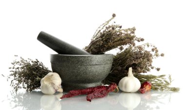 Dried herbs in mortar and vegetables, isolatrd on white clipart