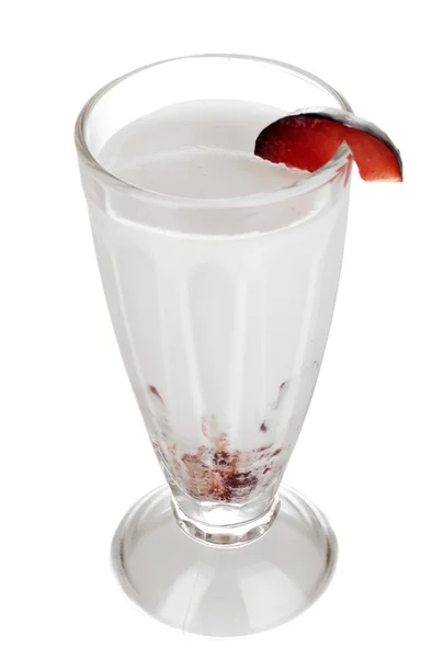 Delicious milk shake with fruit isolated on white — Stock Photo, Image
