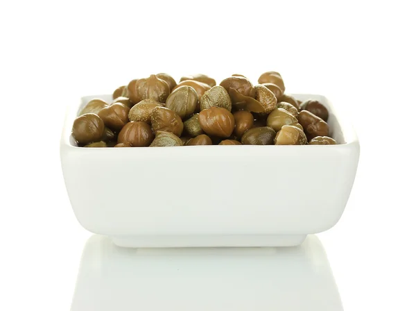 Green capers in white bowl isolated on white background — Stock Photo, Image
