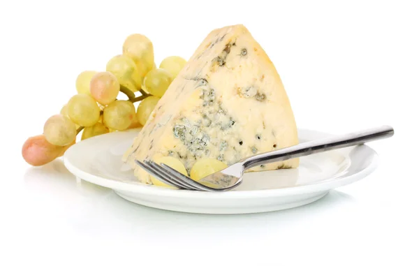 Cheese with mold and grapes on the plate isolated on white — Stock Photo, Image