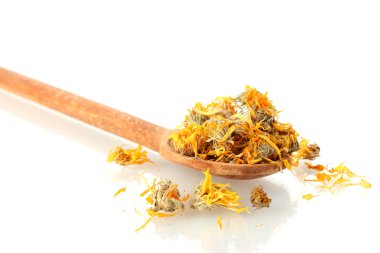 Dried calendula flowers in wooden spoon, isolated on white clipart