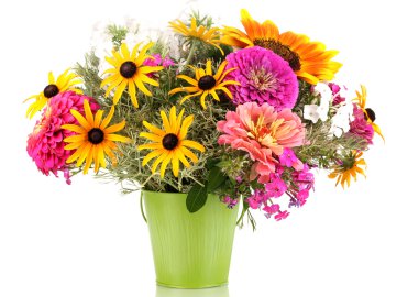 Beautiful bouquet of bright flowers in pail isolated on white clipart