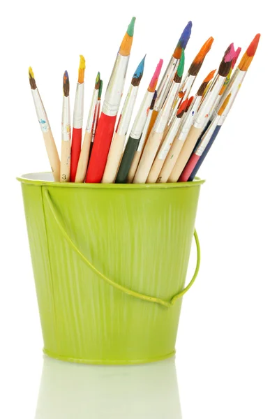 Paint brushes with gouache in bucket isolated on white — Stock Photo, Image