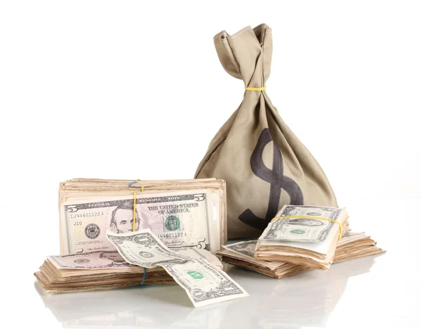 Beyaz izole dolar destesi ile çanta — Stok fotoğraf