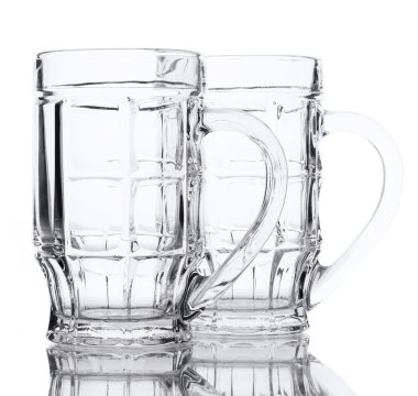 Empty beer glasses, isolated on white clipart