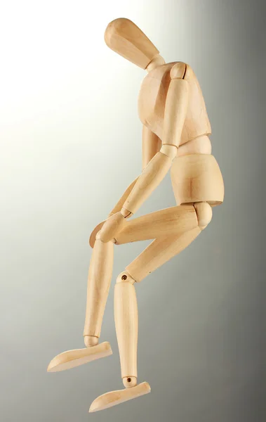 Wooden mannequin, on grey background — Stock Photo, Image