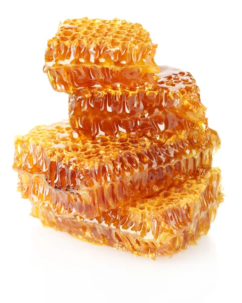 Panales dulces con miel, aislados en blanco —  Fotos de Stock