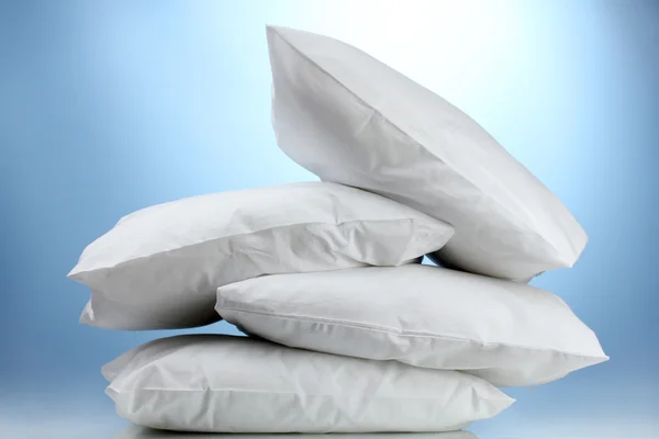 Pillows, on blue background — Stock Photo, Image