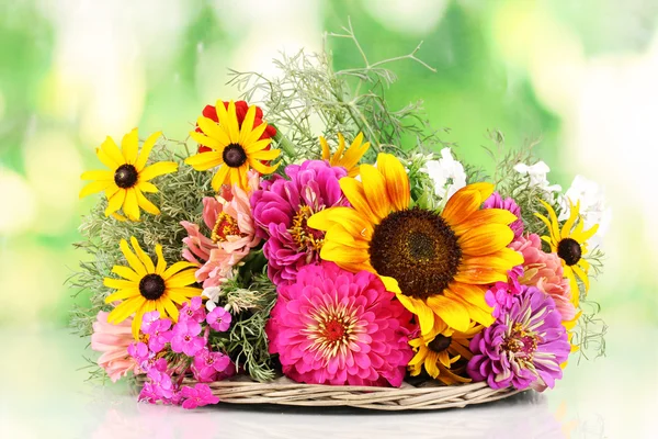 Beautiful bouquet of bright flowers on nature background — Stock Photo, Image