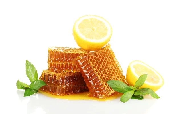 Sweet honeycombs with lemon and mint, isolated on white — Stock Photo, Image